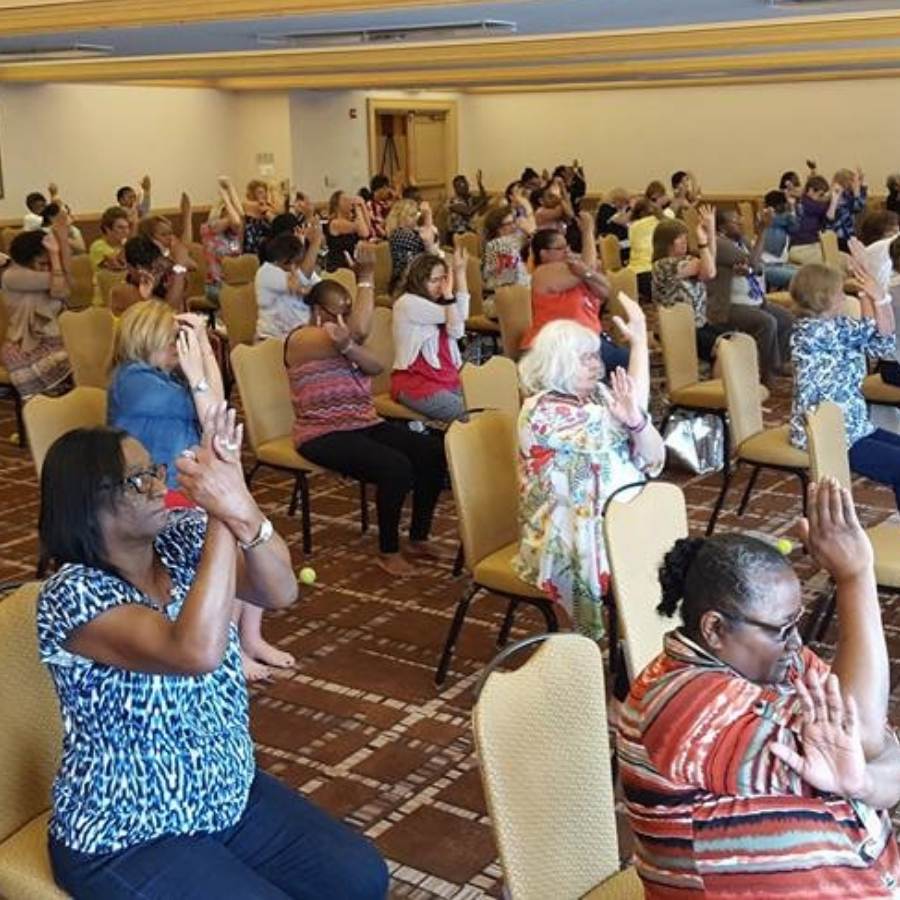lisa long teaches yoga therapy at a women's conference Jacksonville Florida
